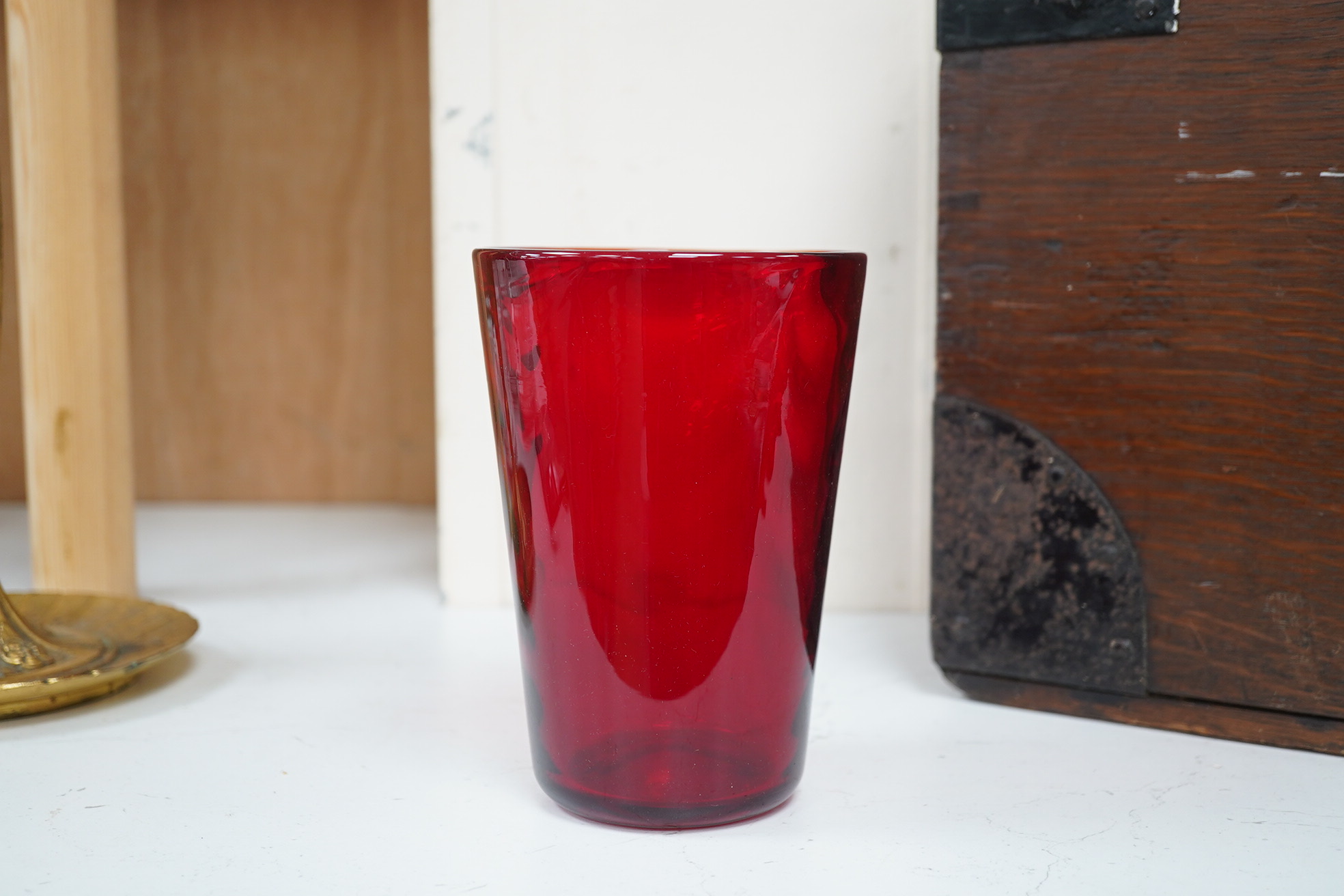 Seven red glass vases including Whitefriars, tallest 21cm high. Condition - good